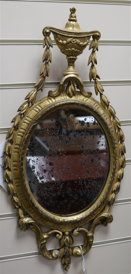 A George III Adam style giltwood wall mirror W.30cm H.62cm